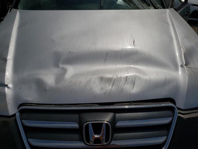 Photo 11 from auction – 2005 HONDA CR-V LX with VIN JHLRD78525C004645