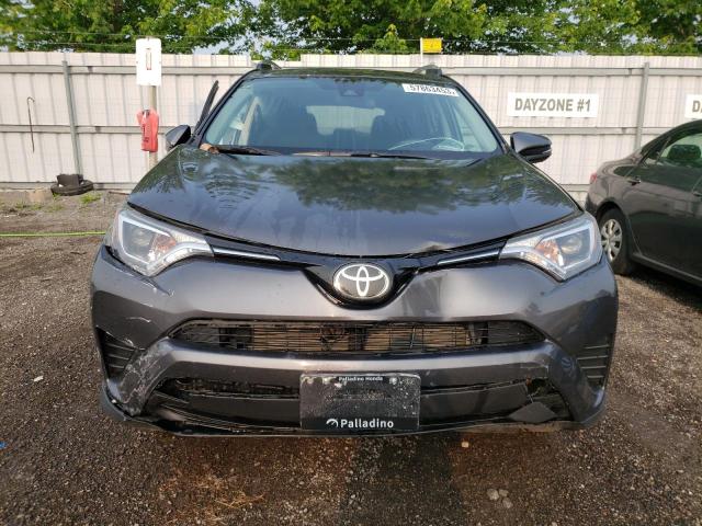Photo 5 from auction – 2018 TOYOTA RAV4 LE with VIN 2T3BFREVXJW768369