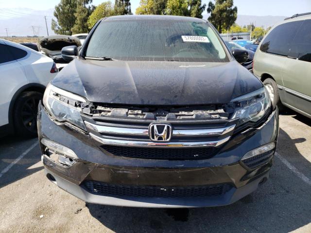 Photo 5 from auction – 2018 HONDA PILOT LX with VIN 5FNYF6H14JB070122