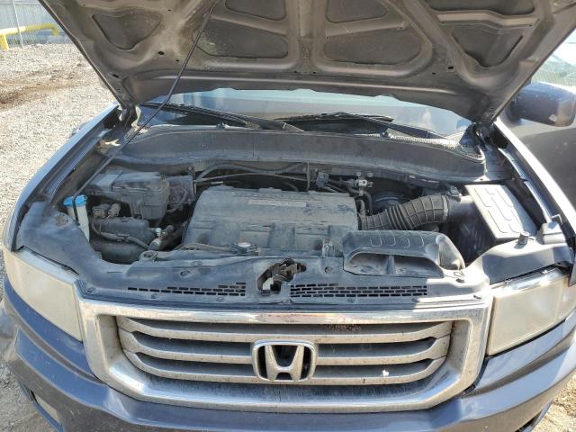 Photo 11 from auction – 2014 HONDA RIDGELINE with VIN 5FPYK1F52EB006906