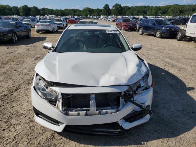 Photo 5 from auction – 2018 HONDA CIVIC EX with VIN 19XFC2F77JE010972