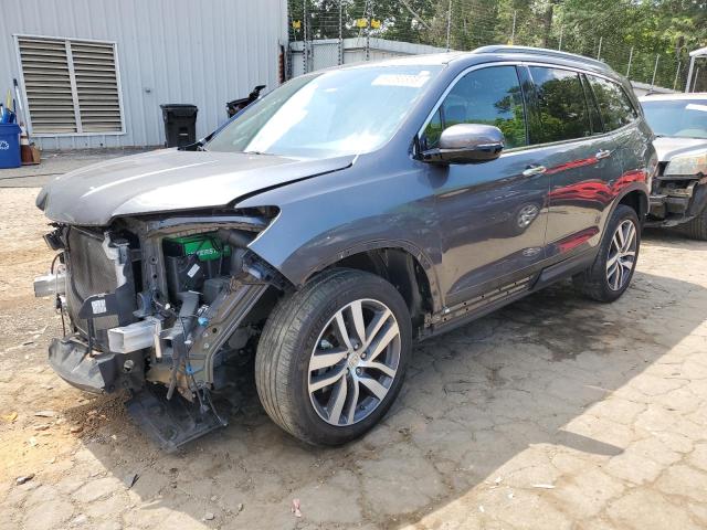 HONDA PILOT ELIT 2017 with VIN 5FNYF6H00HB023638 - Photo from auction