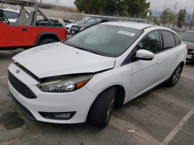 FORD FOCUS SE 2017 with VIN 1FADP3FE5HL235916 - Photo from auction