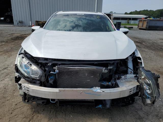Photo 5 from auction – 2018 HONDA CIVIC EX with VIN 19XFC2F72JE036458
