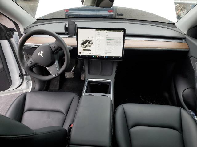 Photo 8 from auction – 2022 TESLA MODEL Y with VIN 7SAYGAEE0NF313473