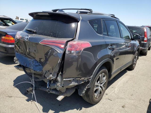 Photo 3 from auction – 2017 TOYOTA RAV4 LE with VIN JTMZFREV0HJ711640