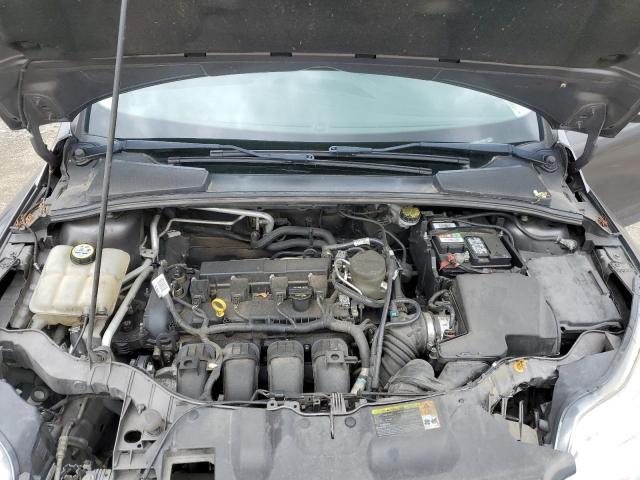 Foto 11 de la subasta – 2012 FORD FOCUS SE con VIN 1FAHP3F24CL198406