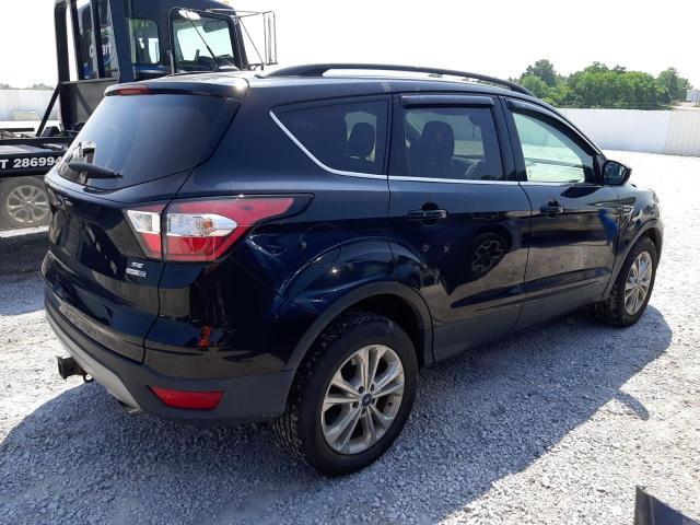 Photo 3 from auction – 2018 FORD ESCAPE SE with VIN 1FMCU9GD5JUC51682