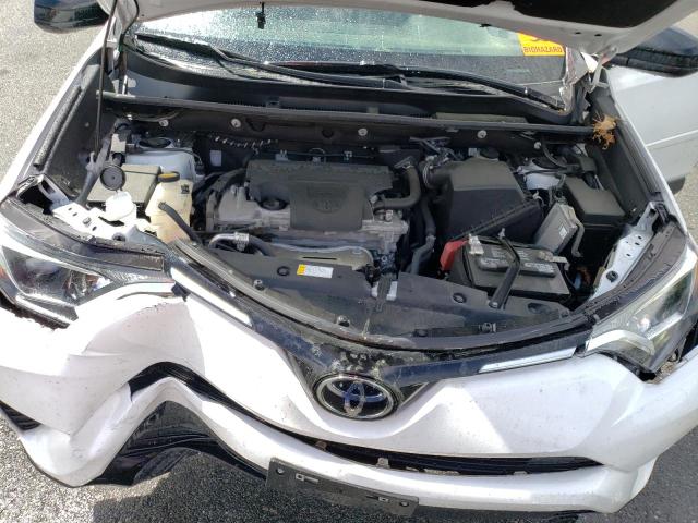 Photo 12 from auction – 2018 TOYOTA RAV4 LE with VIN 2T3BFREV7JW765283