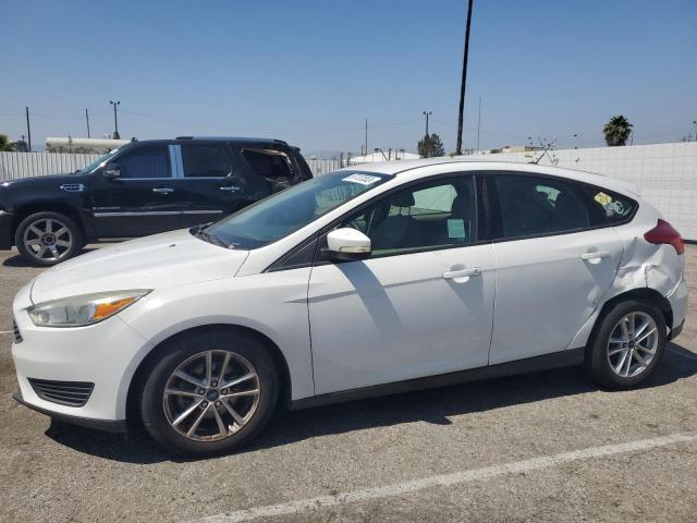 FORD FOCUS SE 2015 with VIN 1FADP3K25FL244897 - Photo from auction