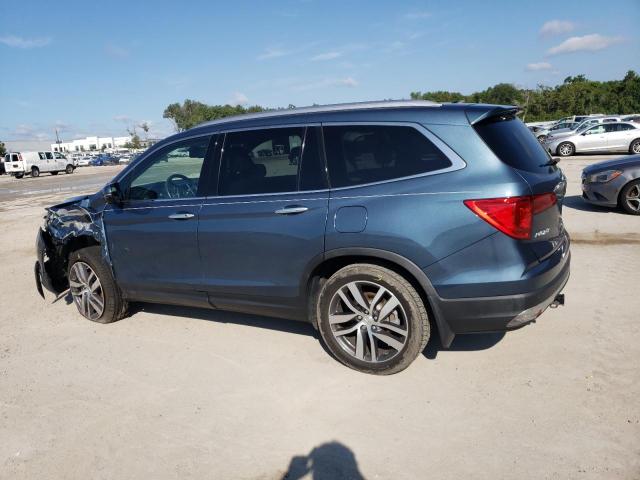 Photo 2 from auction – 2017 HONDA PILOT TOUR with VIN 5FNYF5H94HB032206