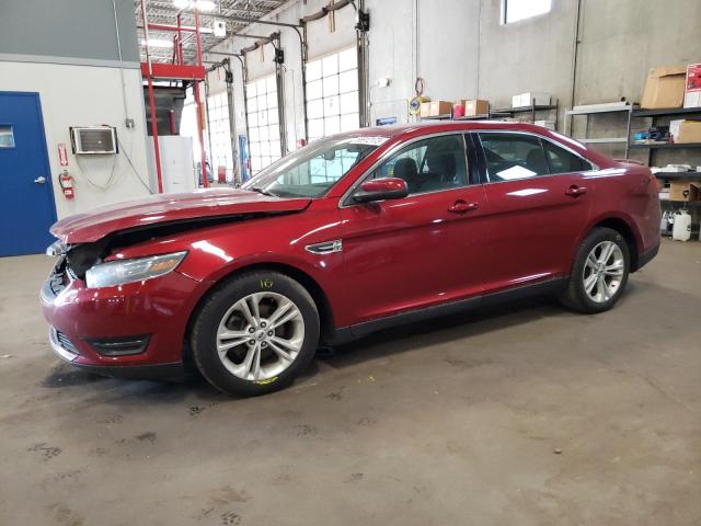 FORD TAURUS SEL 2014 with VIN 1FAHP2E8XEG164384 - Photo from auction