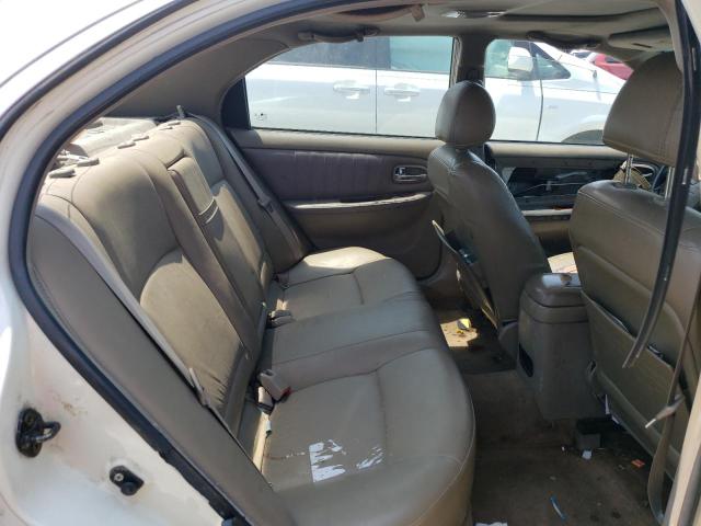 Photo 10 from auction – 2003 KIA OPTIMA LX with VIN KNAGD128935236064