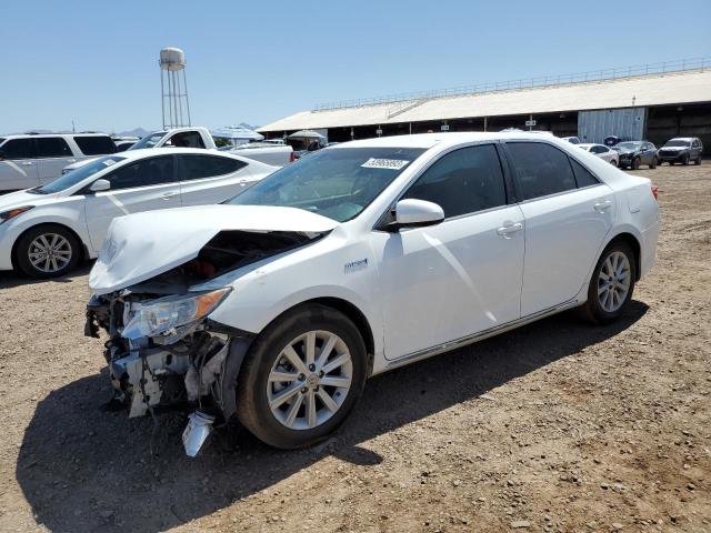 TOYOTA CAMRY HYBR 2012 with VIN 4T1BD1FK3CU040934 - Photo from auction