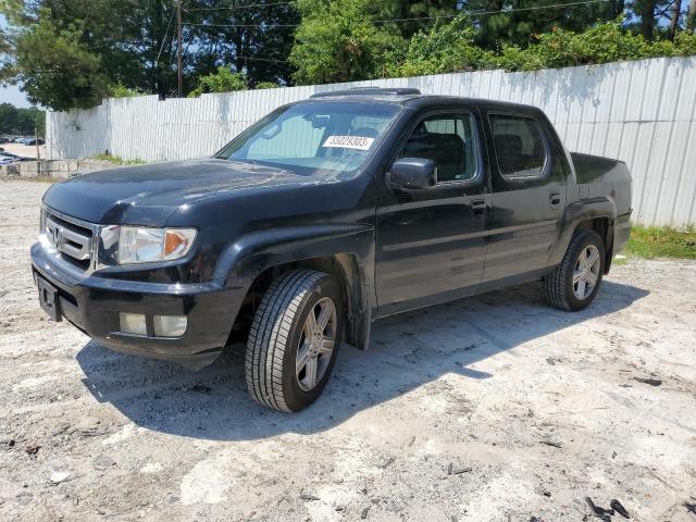 HONDA RIDGELINE 2011 with VIN 5FPYK1F53BB002309 - Photo from auction
