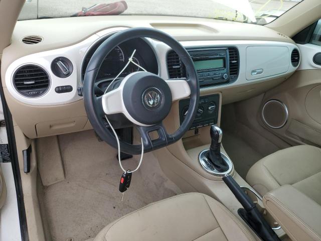 Photo 8 from auction – 2013 VOLKSWAGEN BEETLE with VIN 3VWJP7AT3DM678940