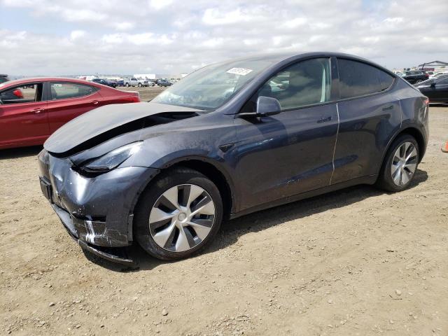 TESLA MODEL Y 2023 with VIN 7SAYGAEE1PF619701 - Photo from auction