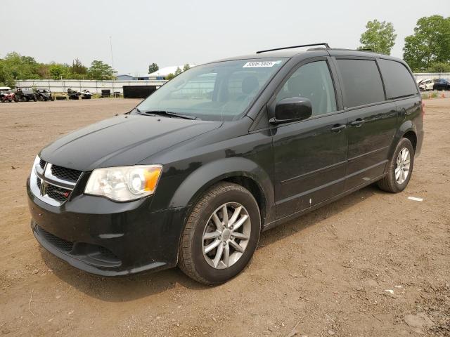 DODGE GRAND CARA 2014 z numerem VIN 2C4RDGCG4ER210501 - Zdjęcie z aukcji