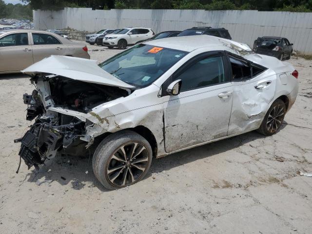 TOYOTA COROLLA L 2017 with VIN 5YFBURHEXHP644107 - Photo from auction