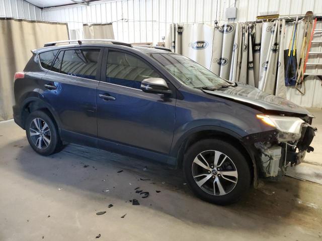 Photo 4 from auction – 2017 TOYOTA RAV4 XLE with VIN JTMWFREV2HD102731