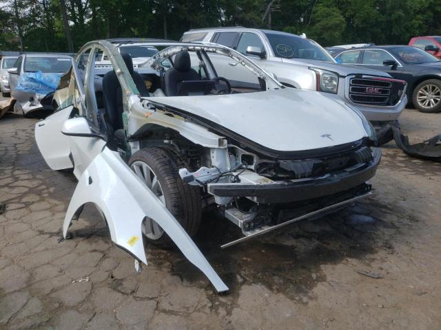 Photo 4 from auction – 2021 TESLA MODEL 3 with VIN 5YJ3E1EC1MF083355