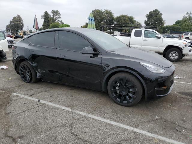 Photo 4 from auction – 2023 TESLA MODEL Y with VIN 7SAYGDEE8PA074336