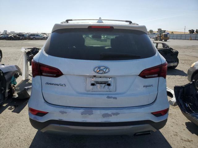 Photo 6 from auction – 2017 HYUNDAI SANTA FE S with VIN 5NMZU3LB0HH034137