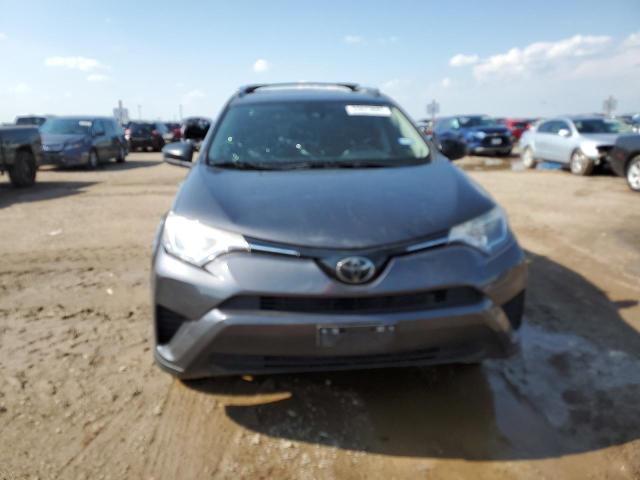 Photo 5 from auction – 2017 TOYOTA RAV4 LE with VIN JTMZFREV7HJ128983