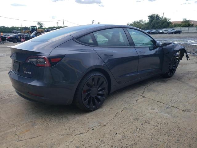 Photo 3 from auction – 2021 TESLA MODEL 3 with VIN 5YJ3E1ECXMF077070