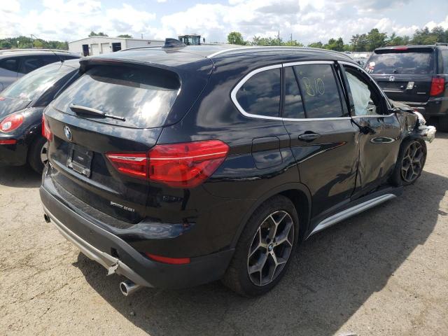 Photo 3 from auction – 2019 BMW X1 XDRIVE2 with VIN WBXHT3C54K3H36773