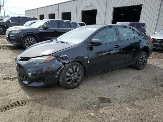 TOYOTA COROLLA L 2017 with VIN 5YFBURHE4HP715186 - Photo from auction