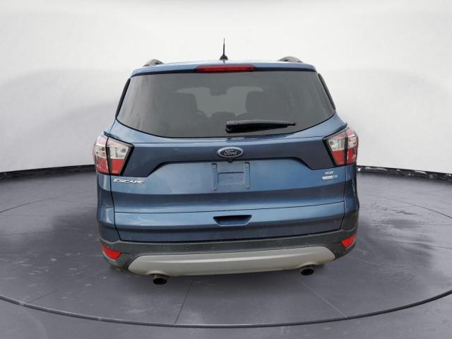 Photo 6 from auction – 2018 FORD ESCAPE SE with VIN 1FMCU9GD4JUC95110