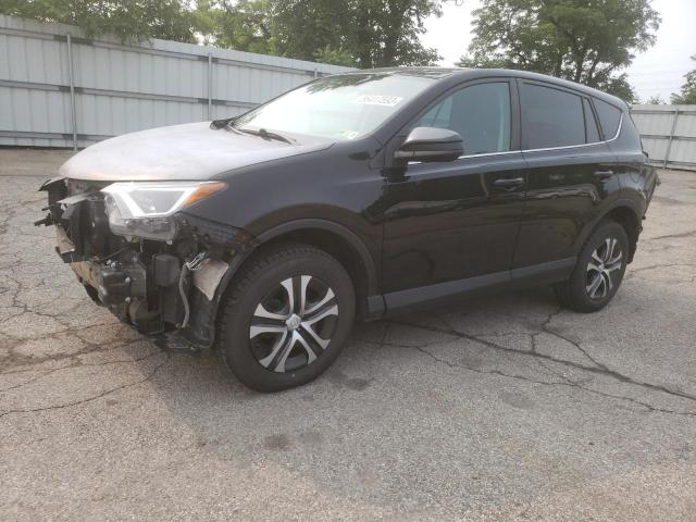 TOYOTA RAV4 LE 2018 with VIN 2T3BFREV7JW777501 - Photo from auction
