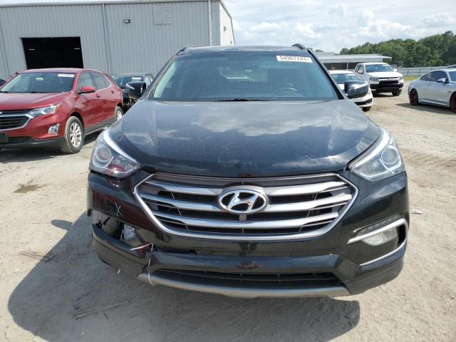 Photo 5 from auction – 2018 HYUNDAI SANTA FE S with VIN 5NMZU3LB7JH065536