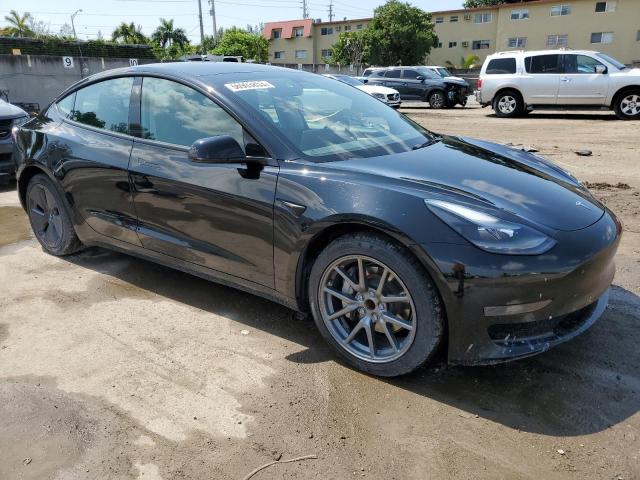 Photo 4 from auction – 2021 TESLA MODEL 3 with VIN 5YJ3E1EA5MF089304