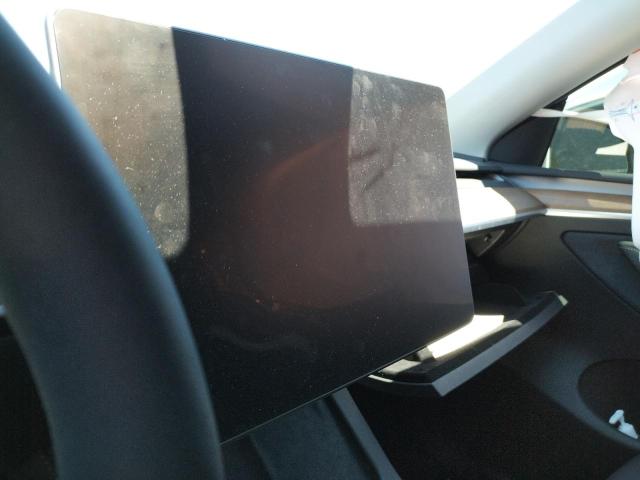 Photo 9 from auction – 2023 TESLA MODEL Y with VIN 7SAYGDEE7PF675725