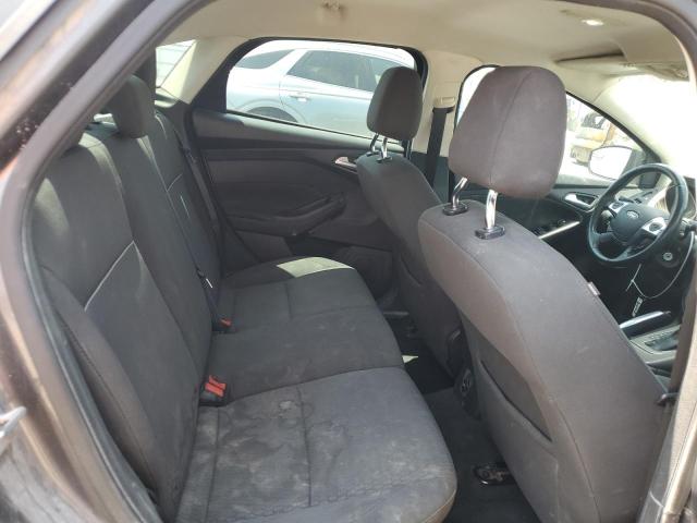 Foto 10 de la subasta – 2012 FORD FOCUS SEL con VIN 1FAHP3H22CL105783