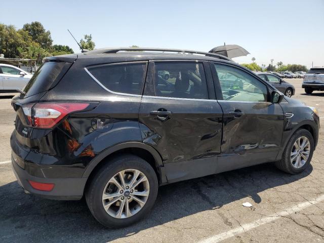 Photo 3 from auction – 2018 FORD ESCAPE SE with VIN 1FMCU0GD2JUC61663