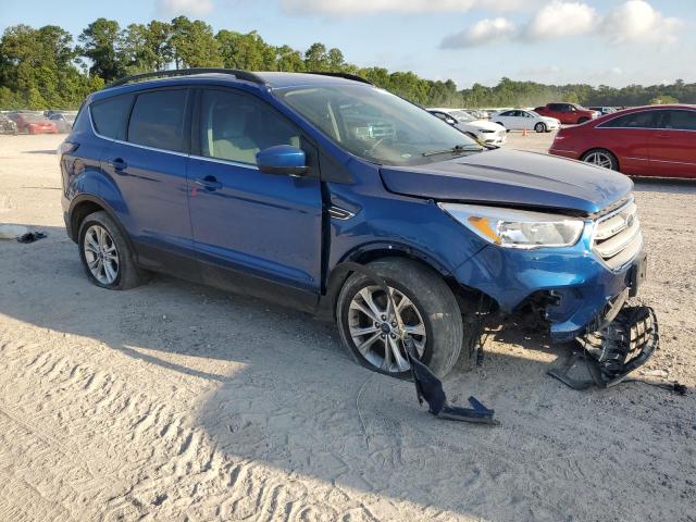 Photo 4 from auction – 2018 FORD ESCAPE SE with VIN 1FMCU9GD1JUC01569