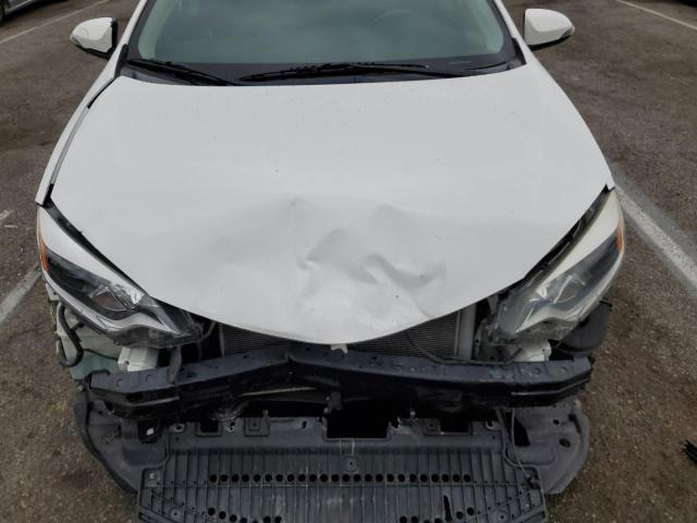 Photo 11 from auction – 2014 TOYOTA COROLLA L with VIN 2T1BURHE2EC165661