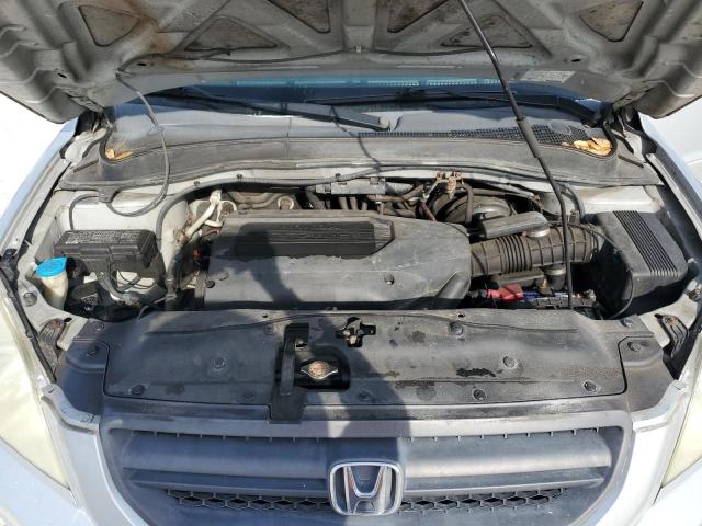 Photo 12 from auction – 2003 HONDA PILOT EX with VIN 2HKYF18483H530769