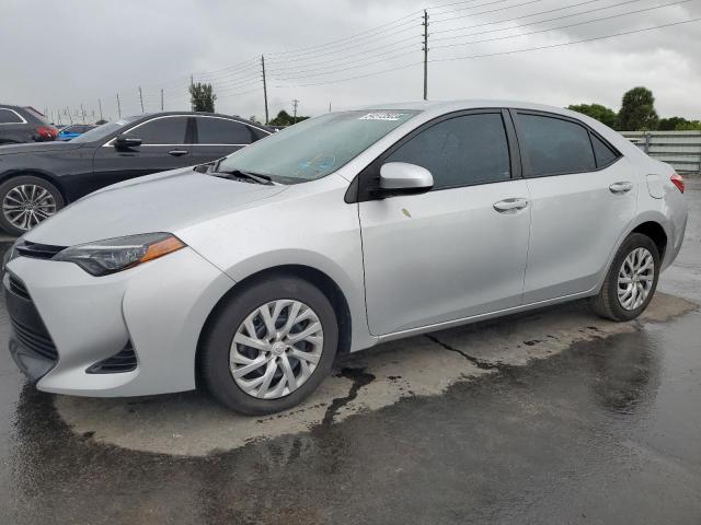 TOYOTA COROLLA L 2017 with VIN 5YFBURHE1HP735475 - Photo from auction