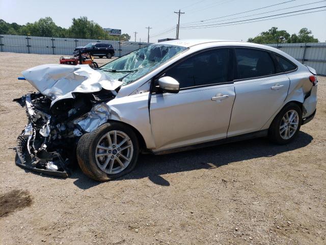 FORD FOCUS SE 2016 with VIN 1FADP3F20GL235617 - Photo from auction