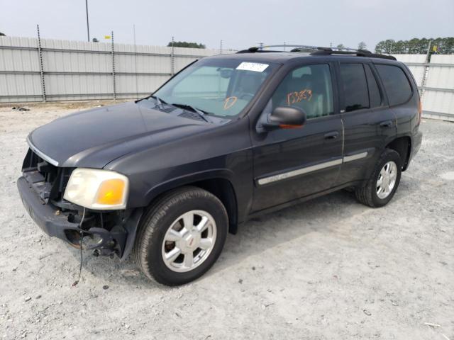 GMC ENVOY 2003 with VIN 1GKDS13S432356494 - Photo from auction