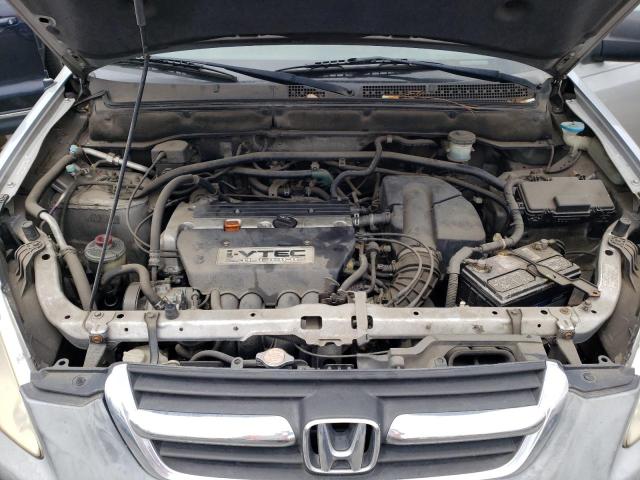 Photo 11 from auction – 2002 HONDA CR-V LX with VIN JHLRD68432C025811