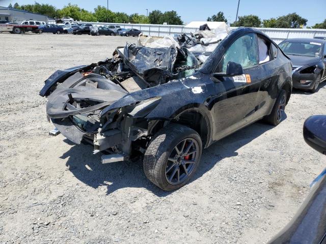 TESLA MODEL Y 2023 with VIN 7SAYGDEF0PF601992 - Photo from auction