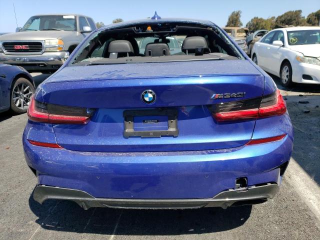 Photo 6 from auction – 2022 BMW M340I with VIN 3MW5U7J02N8C27587