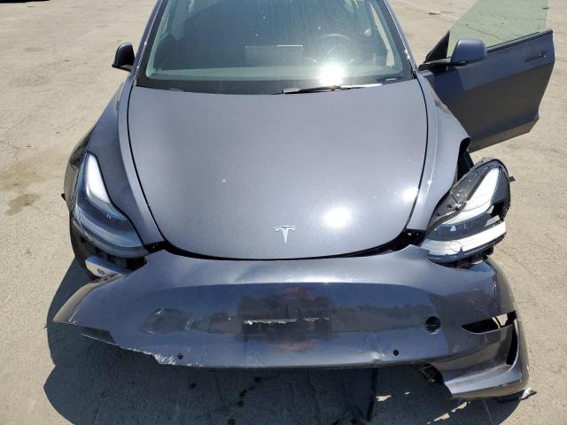 Photo 11 from auction – 2022 TESLA MODEL 3 with VIN 5YJ3E1EB1NF111812