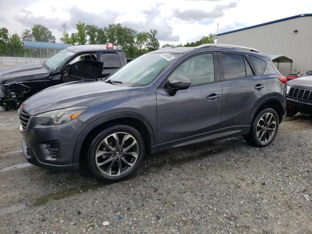 MAZDA CX-5 GT 2016 with VIN JM3KE2DY1G0690882 - Photo from auction
