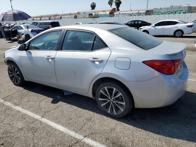 Снимка 2 от търг – 2017 TOYOTA COROLLA L с VIN 5YFBURHE2HP580435